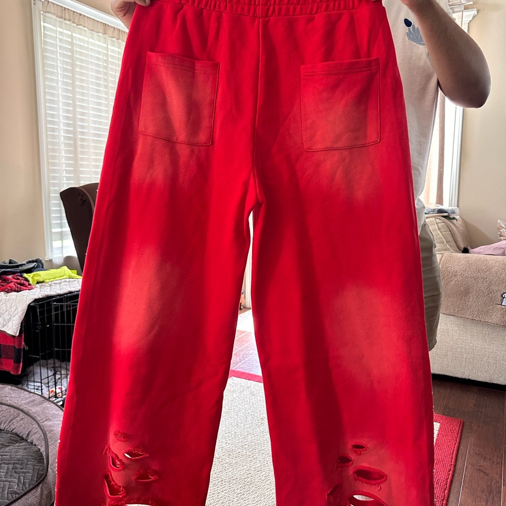 New without tags Ozara red sweat pants with rhinestones. Size Med